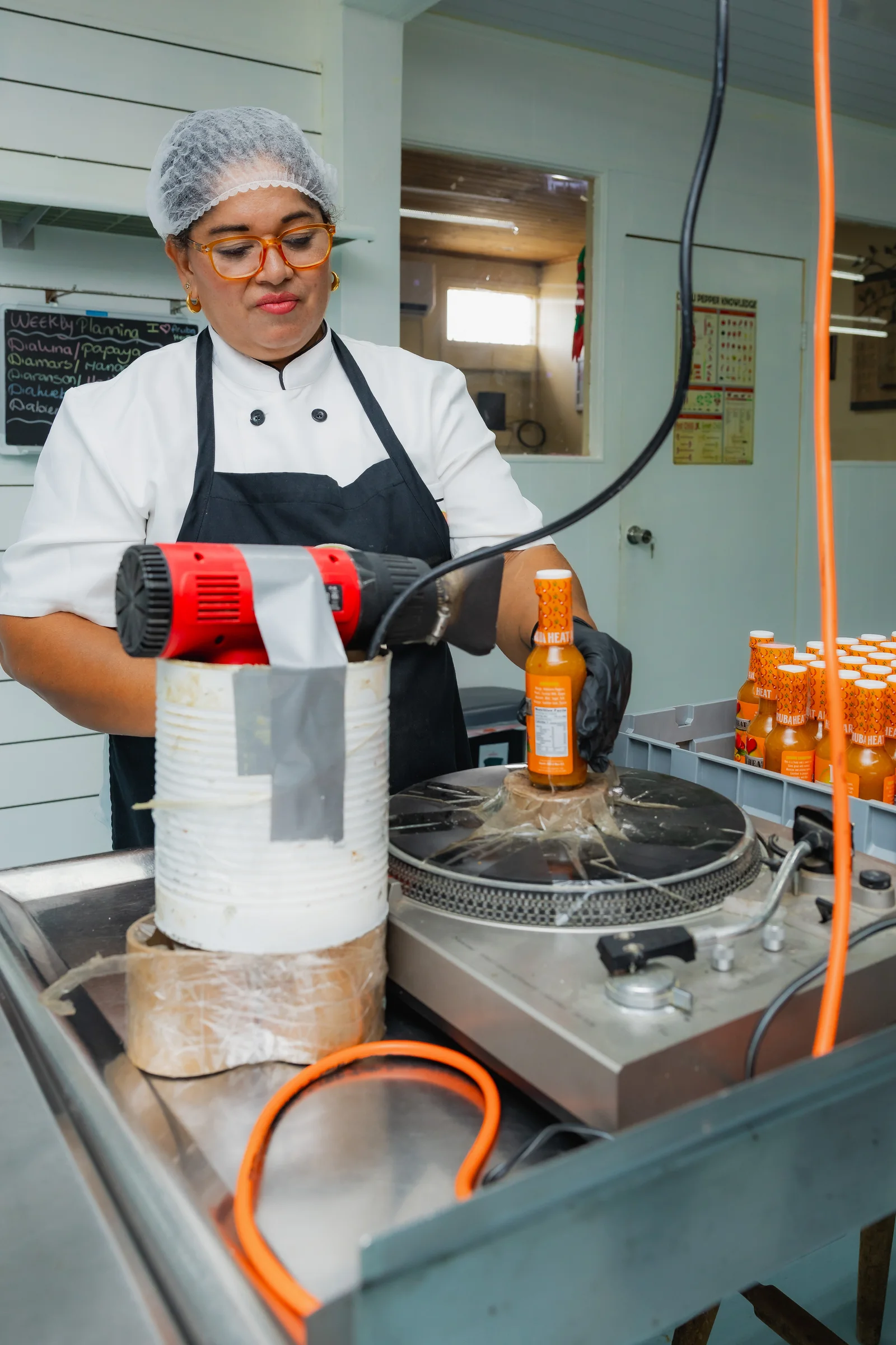 Bottles being labelled on the line